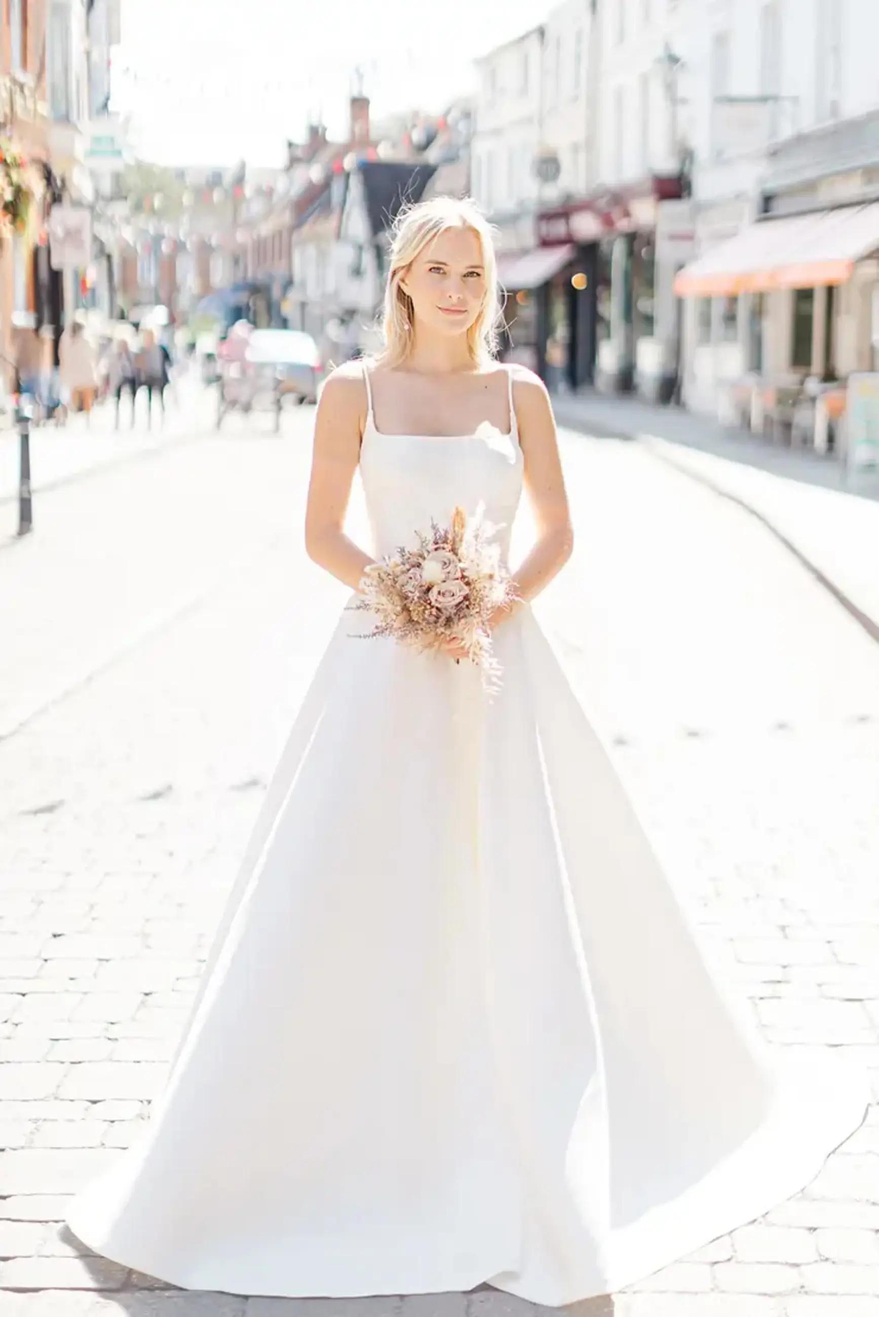 Morgan Davies Bridal Model wearing Freda Bennet Bridal dress