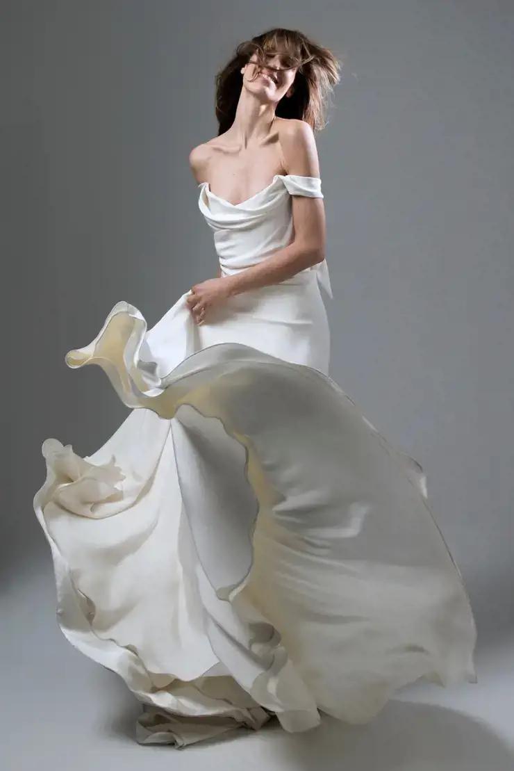 Morgan Davies Bridal model wearing a bridal dress designed by Halfpenny London