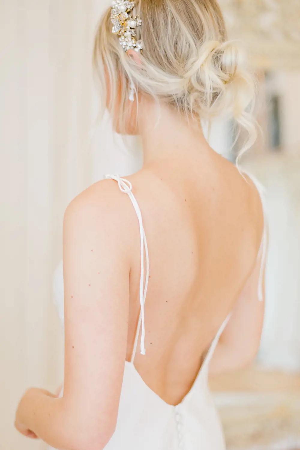 Morgan Davies Bridal model wearing a bridal headband for bridal accessory